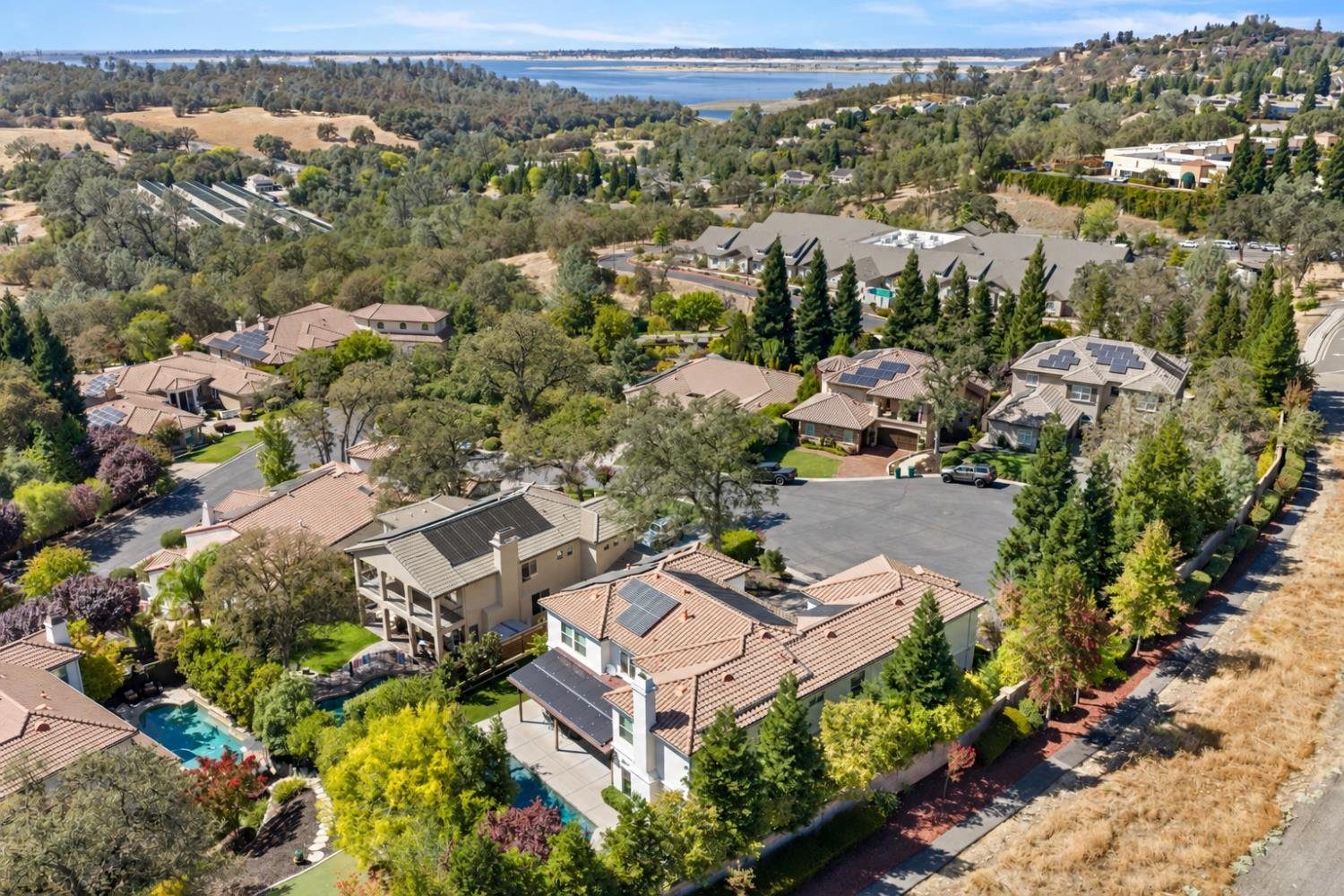 The house at the end of the cul de sac from the air, with Folsom Lake beyond